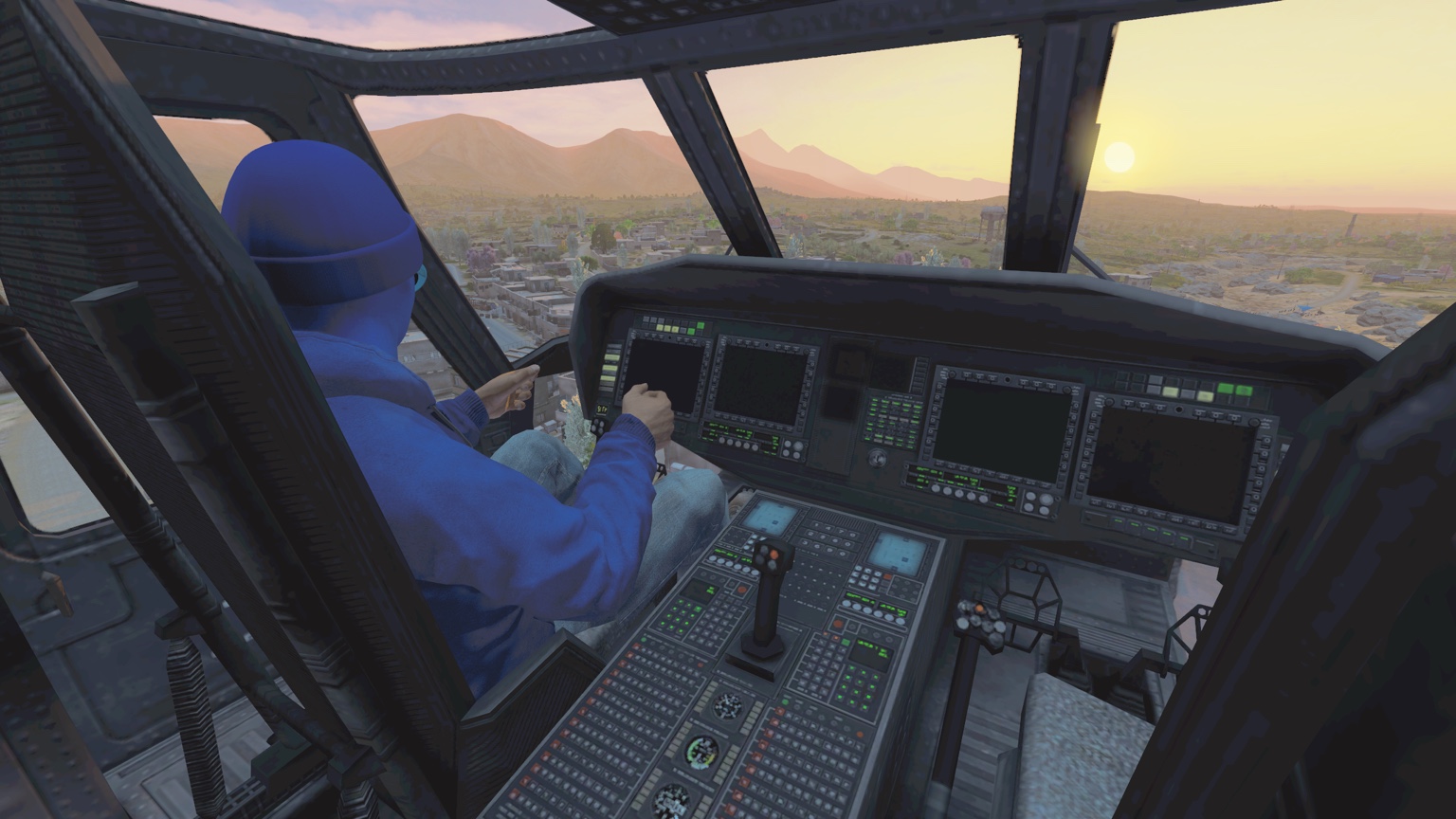 A blue-clad pilot inside a helicopter cockpit